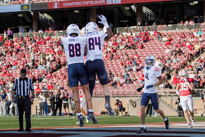 Sep 23, 2023; Stanford, California, USA; Arizona Wildcats tight end Tanner McLachlan (84) is congratulated by tight end Keyan Burnett (88) after scoring a touchdown against the Stanford Cardinal during the second quarter at Stanford Stadium. Mandatory Credit: John Hefti-USA TODAY Sports